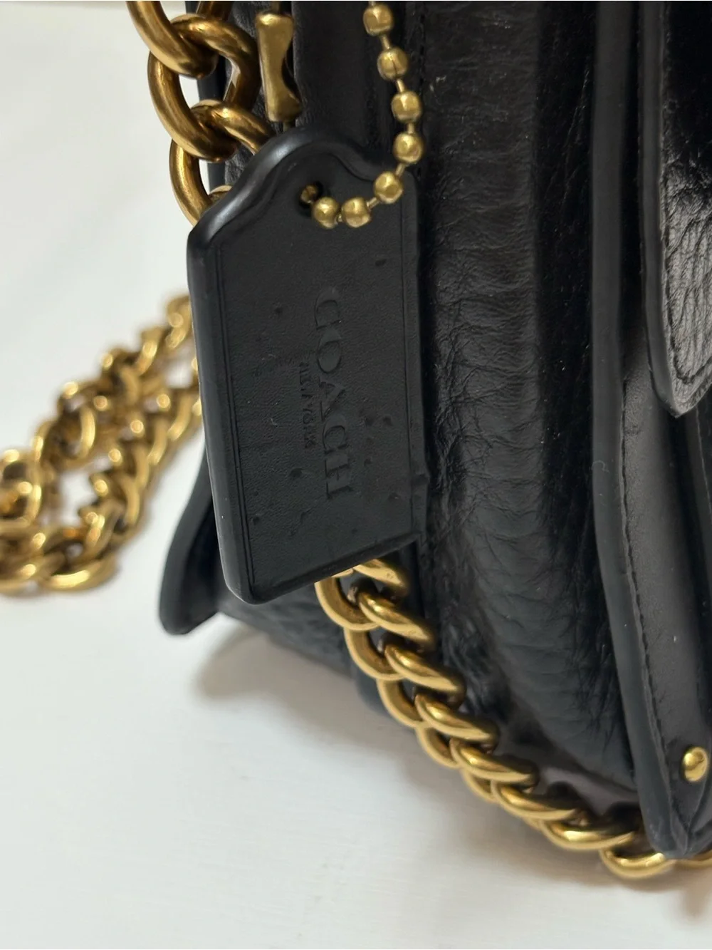Coach sleek black